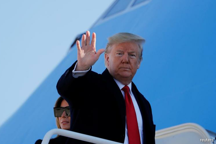 Crowds gather to greet Trump hours before he lands in India