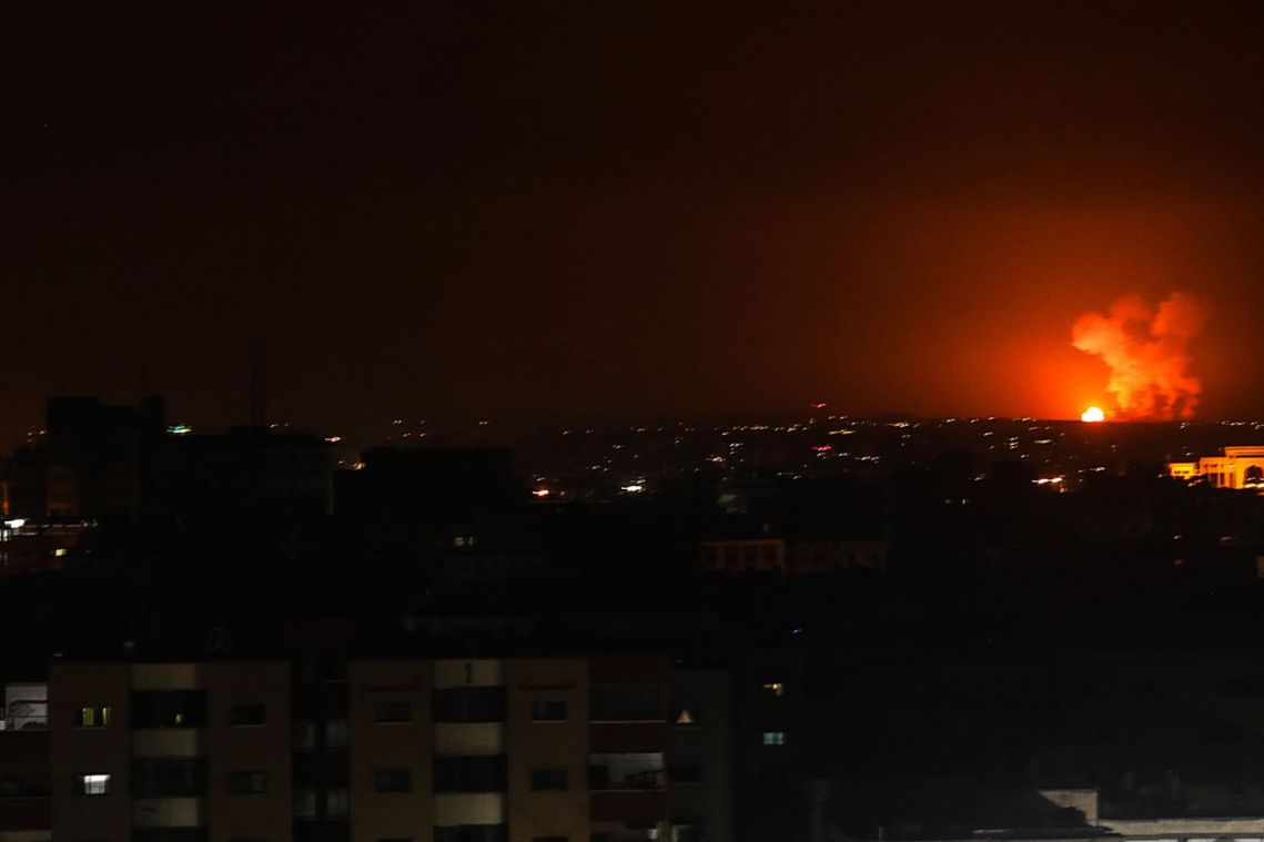 Israel strikes militants in Syria and Gaza after clash over body at border