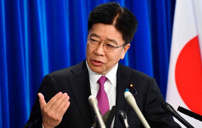 Third death from Japan cruise ship as health minister vows to set virus strategy
