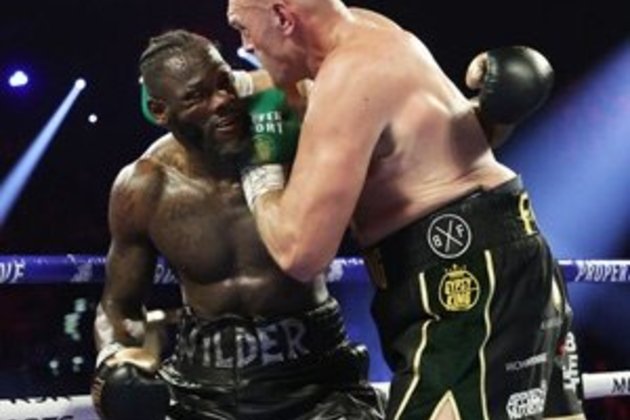 Wilder keeping cornerman Breland, vows to 'rise again'