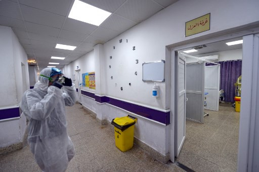 Iraq bans public gatherings on virus fear; travel ban totals 9 countries