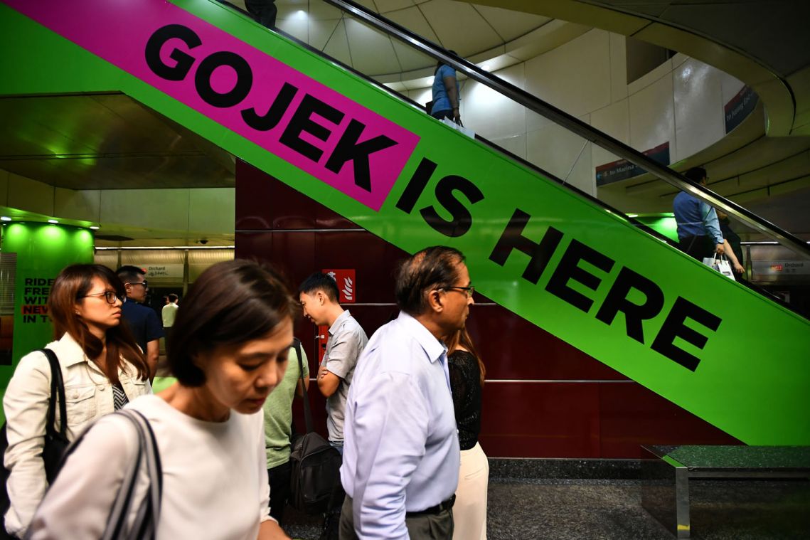 Gojek denies report of merger talks with Grab