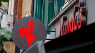 Nando’s employees call for changes to cleaning pay policy