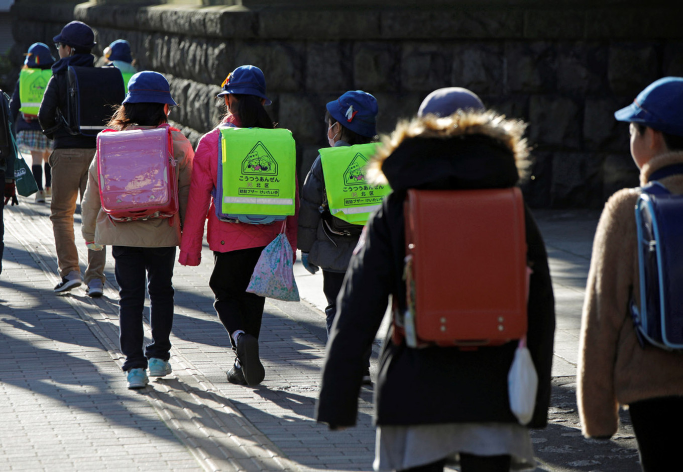 Japan scrambles for workarounds after Abe urges March school shutdown