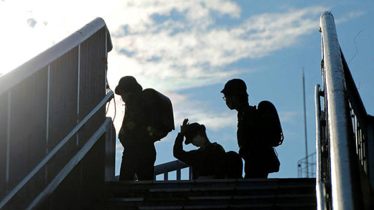 Japan scrambles for workarounds after Abe urges March school shutdown to stem Coronavirus