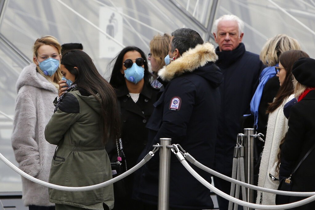 French urged to stop cheek-to-cheek kisses to contain virus