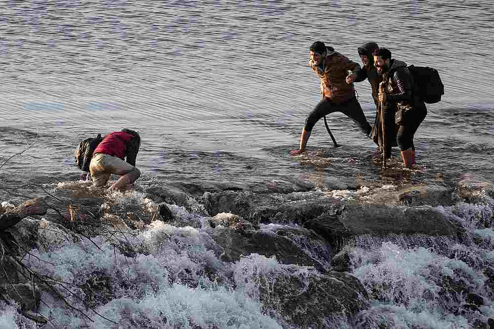 Migrants clash with Greek police at border after Turkey opens floodgates