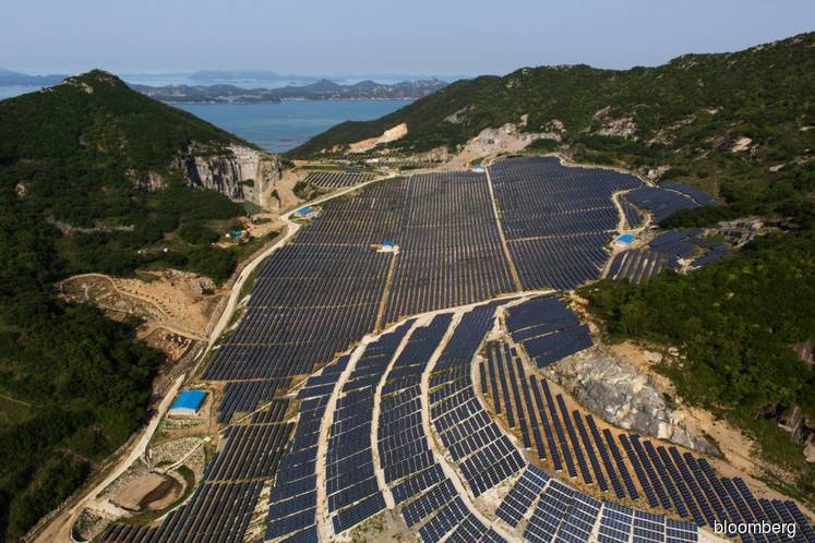 Asian finance group pushes softer standards for green deals