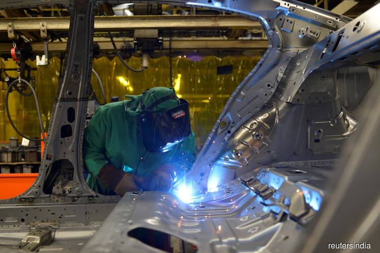 U.S. manufacturing sector slows; construction spending hits record high