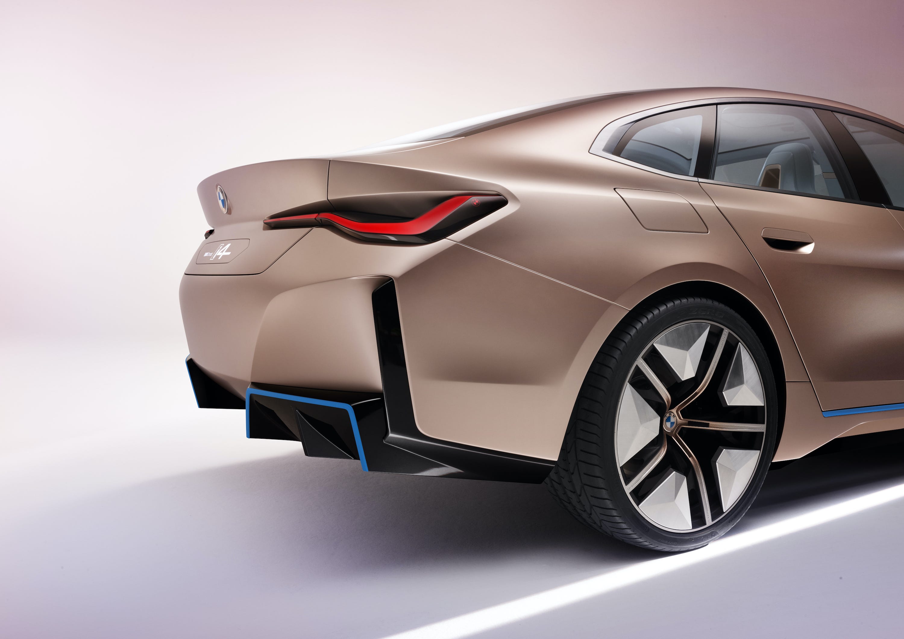 BMW just revealed the near-production version of its stunning new rose-gold electric sedan that will rival Tesla