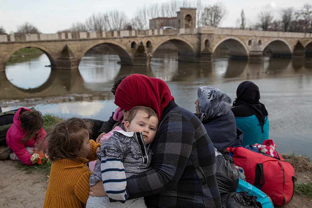 In a bind over Turkey, EU finds money to contain immigration