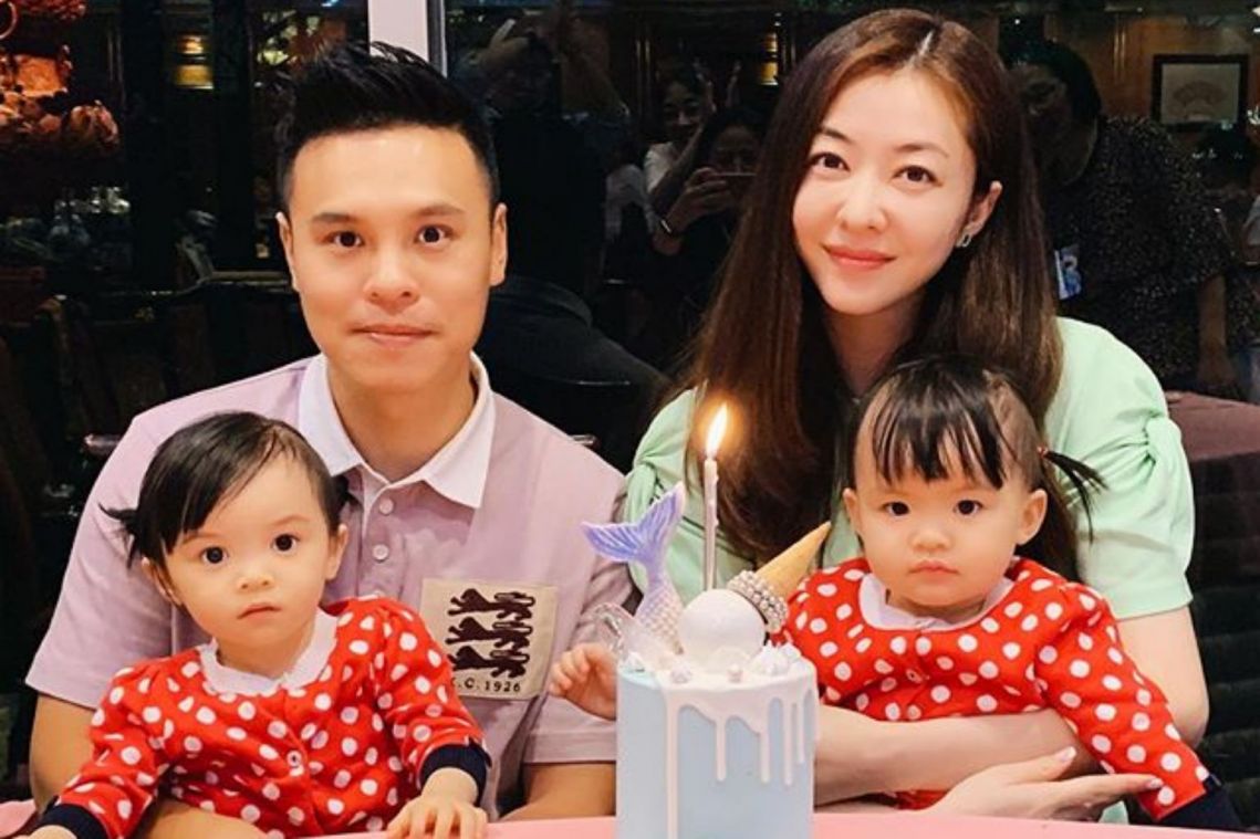 Hong Kong-based model Lynn Hung disinfects her daughters and husband copiously on an outing