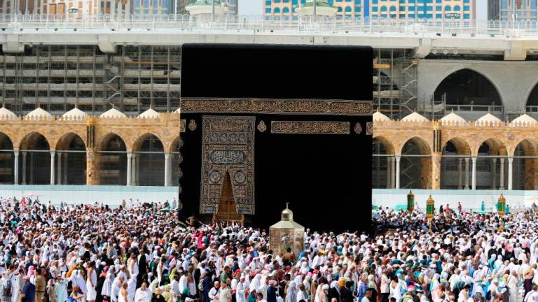 Saudi risks fallout with coronavirus curbs on holy sites
