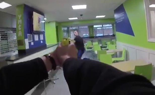 Police bodycam captures moment man is Tasered while throwing microwave during standoff