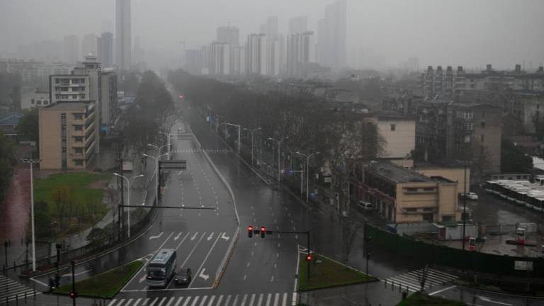 ‘Suspense is killing us’: S. African stranded by China virus lockdown