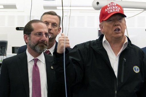 Two US lawmakers exposed to virus before meeting Trump