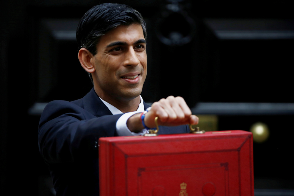 UK finance minister says travel bans will hurt economy