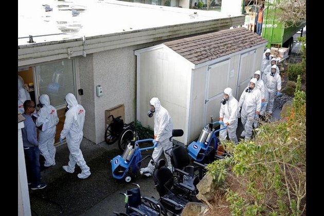 Virus cases in U.S. top 1,000 as officials demand more testing kits