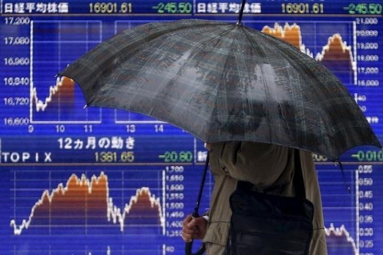 Japanese stocks dive deeper into bear market as Trump stuns with travel ban