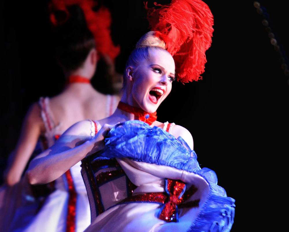 Hope, defiance at last Moulin Rouge show before virus shutdown