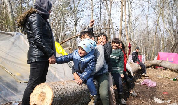 Greece on brink as first cases of coronavirus found among 100,000 in refugee camps
