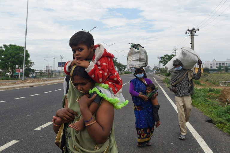 Stranded by virus lockdown, India migrant workers walk home