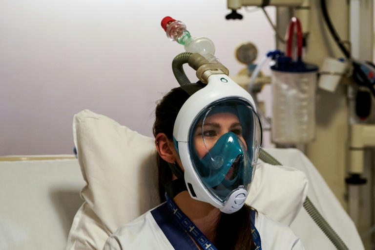 Hospitals turn to snorkel masks amid respirator overload