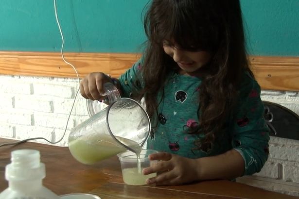 Father and daughter make hand gel from aloe vera to give away amid coronavirus outbreak