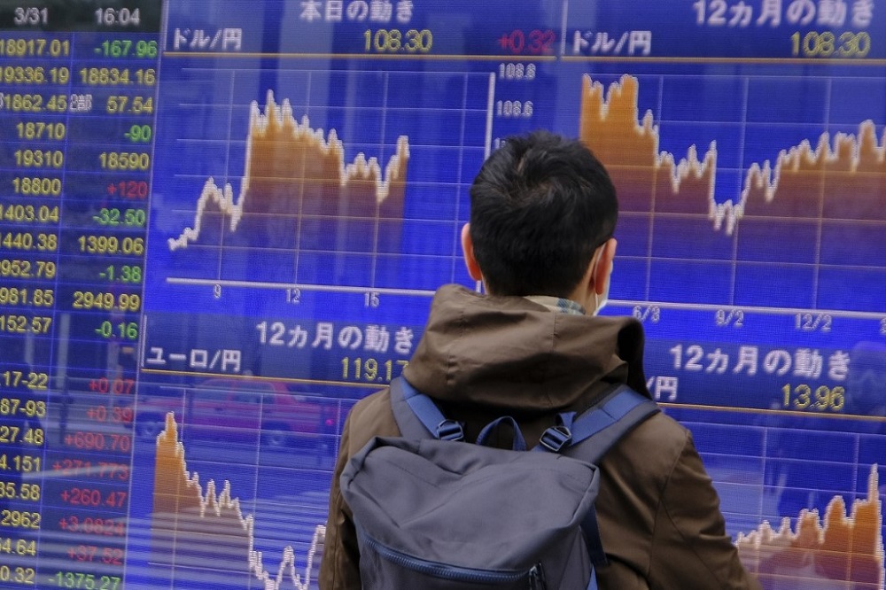 Asian stocks slip as Trump warns of horrors to come