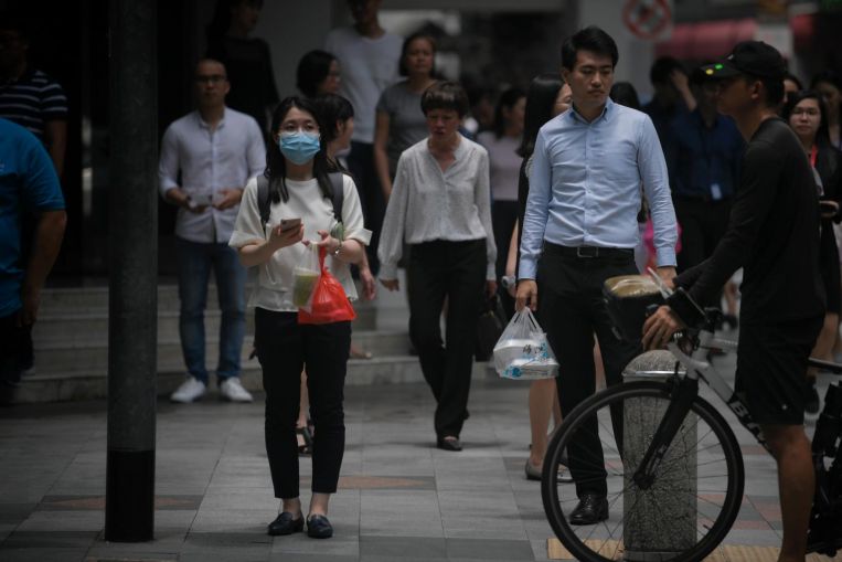 Coronavirus: Benefits of mask use by healthy people topic of debate in Singapore