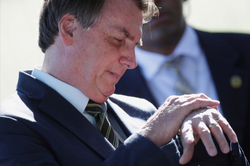 Brazil's bolsonaro isolated, weakened by coronavirus denial