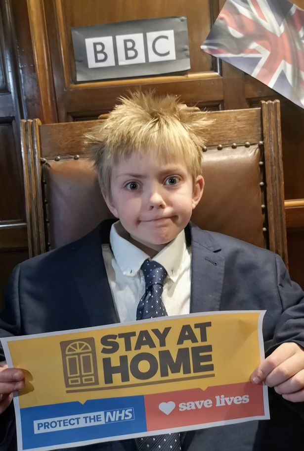Boris Johnson 'lookalike', 9, writes virus rap as blond locks grow out in quarantine