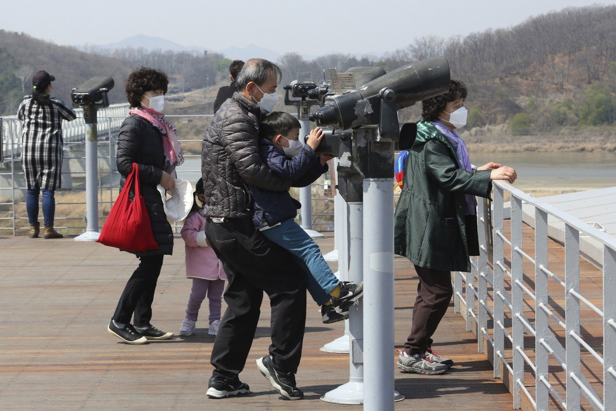Coronavirus: South Korea urges caution as scenic spots packed amid dwindling case numbers