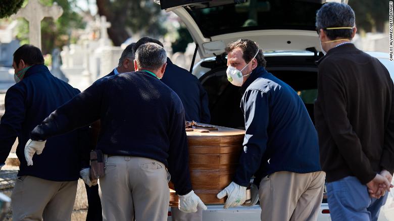Drive-through funerals are being held in the epicenter of Spain's coronavirus pandemic