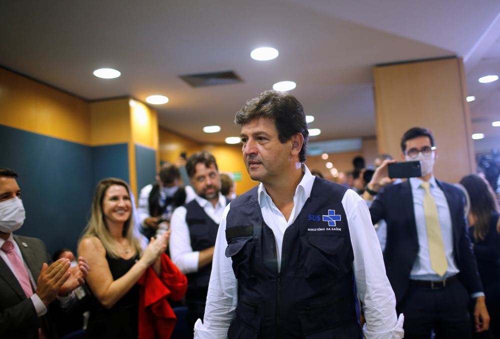 Brazil's health minister holds job in clash with Bolsonaro