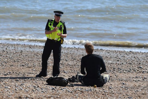 Sunbathing during lockdown is banned - but it's up to police to enforce the rules