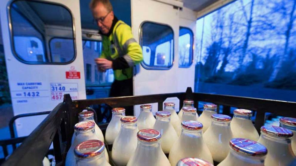 Deprived of customers, British farmers throw away milk