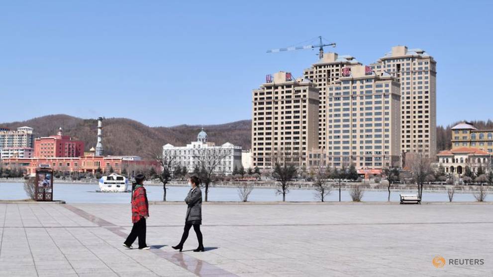 China steps up scrutiny of inbound travellers as imported COVID-19 cases hit record