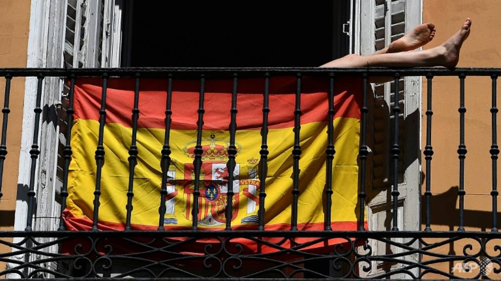 Cautious hope for COVID-19 peak as Spain readies to reopen some factories