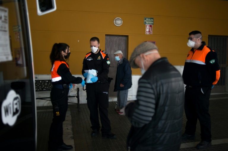 Back to work for some in Spain as death rate eases