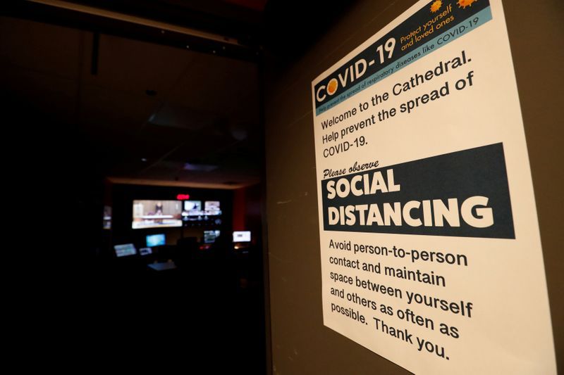 California governor says mass gatherings unlikely through summer