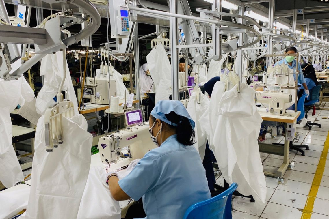 Indonesian clothing maker pivots from Prada to hazmat suits