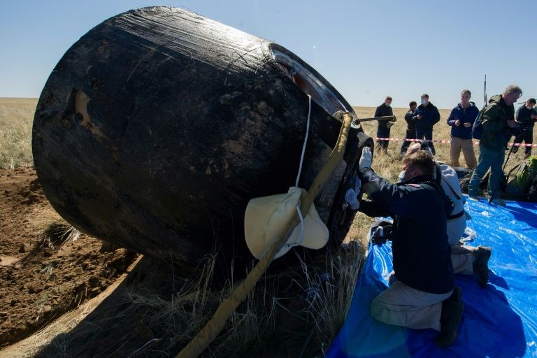 Astronauts land back on earth transformed by pandemic