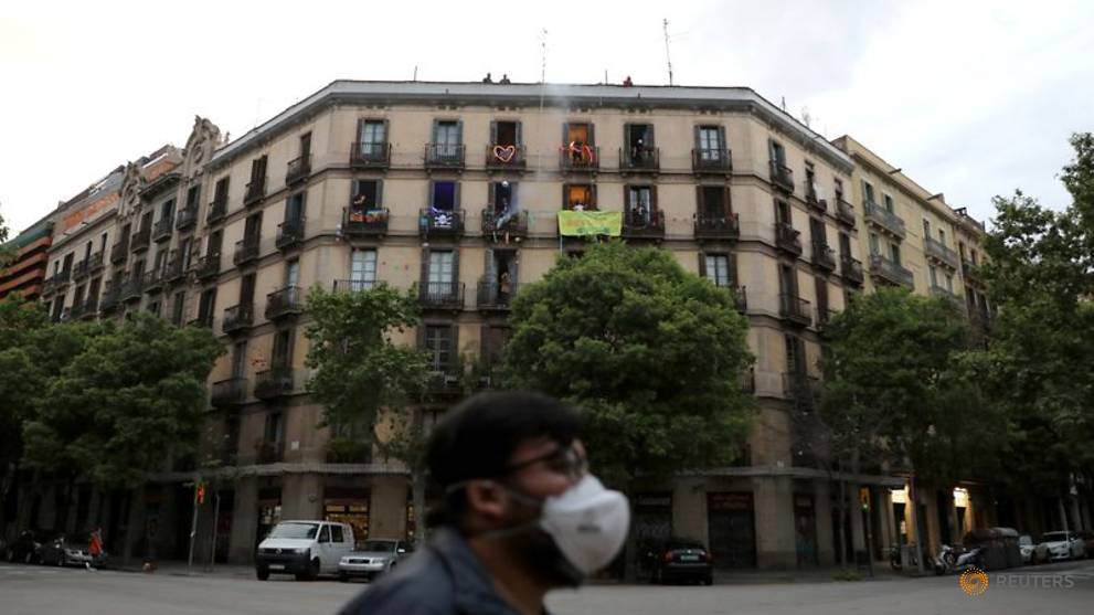 Spain's COVID-19 deaths surpass 20,000 as it mulls extending confinement