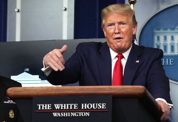 Donald Trump suspends all US immigration to fight 'invisible enemy' coronavirus