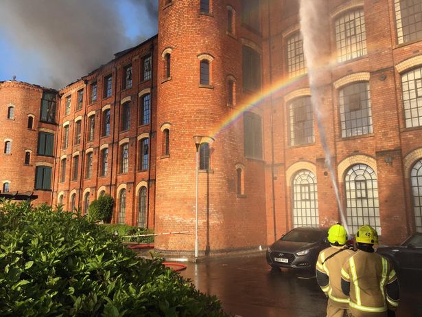 Huge fire rips through block of flats causing severe damage and leaving people homeless