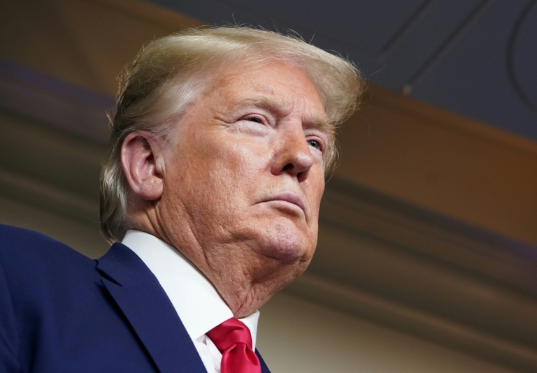 As virus crisis swirls, Trump puts immigration front and center