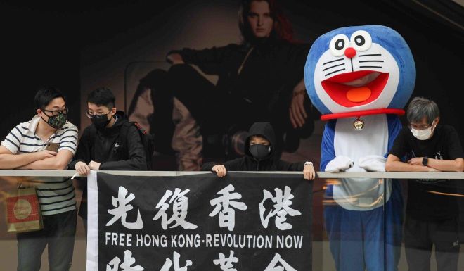 Coronavirus: testing Covid-19 restrictions, protesters gather in the heart of Hong Kong