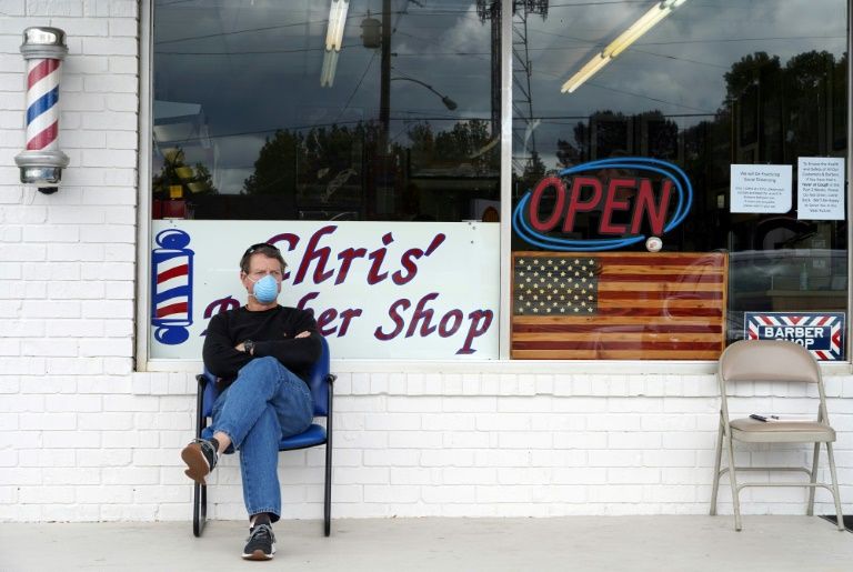 US death toll tops 50,000 as some Georgia businesses reopen
