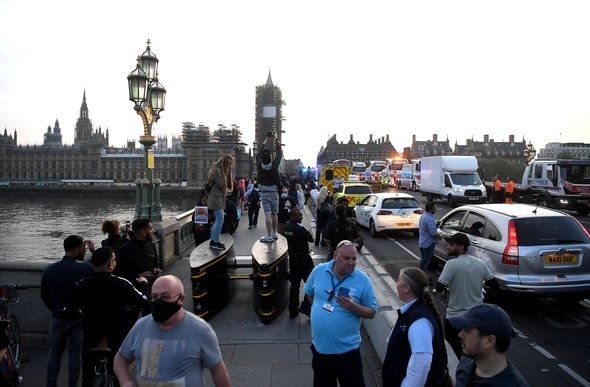 Westminster Bridge ‘clowns’ spark FURY by gathering in huge crowds NHS clap
